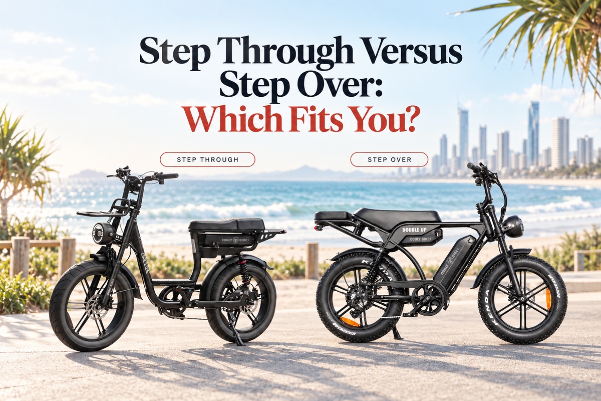 Cooly Bikes comparison graphic showing a step-through Breeze and a step-over Double Up parked side by side on a sunny coastal foreshore, with the headline “Step Through Versus Step Over: Which Fits You?”