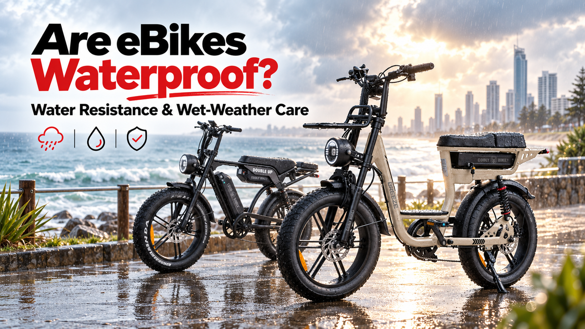 Cooly Breeze and Cooly Double Up eBikes on a wet Gold Coast coastal path for a guide to eBike water resistance and wet-weather care.
