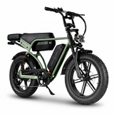 A green and black electric fat tire bike with a step-through frame, black seat, and front headlight, shown on a plain white background.