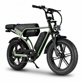 A green and black electric fat tire bike with a step-through frame, black seat, and front headlight, shown on a plain white background.