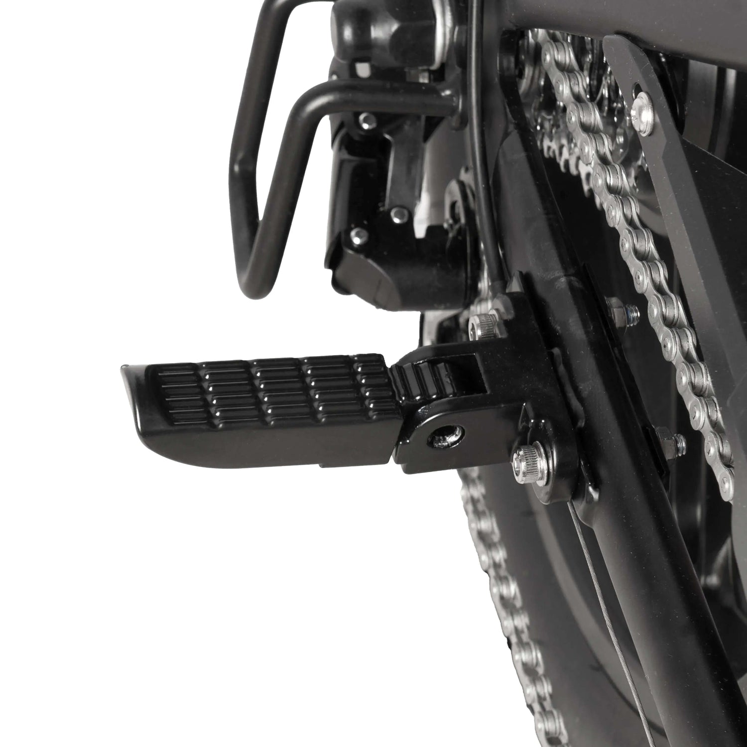 Close-up of a motorcycle chain and foot peg on a white background